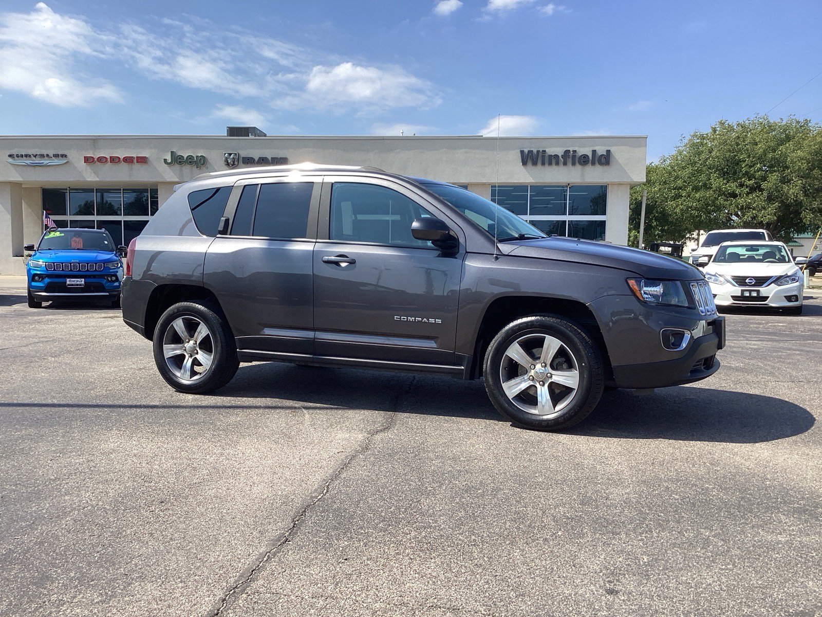 Used 2016 Jeep Compass High Altitude with VIN 1C4NJDEB1GD708426 for sale in Winfield, KS