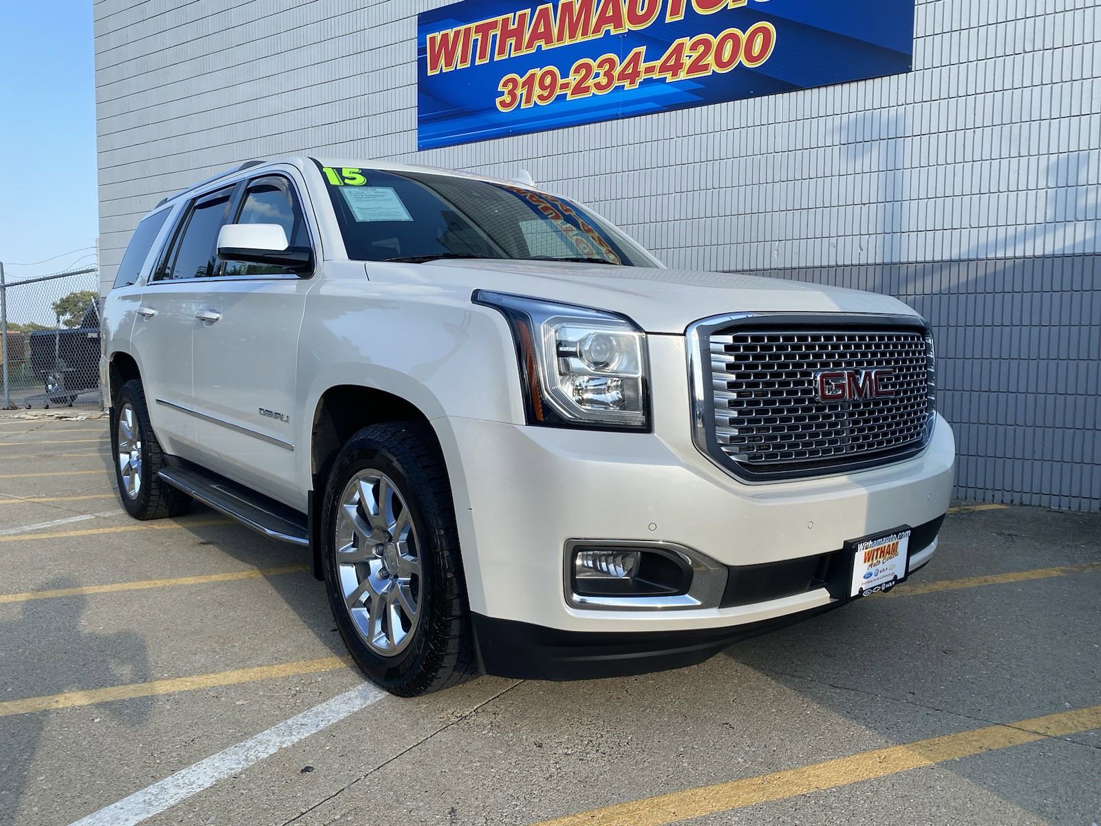 Used 2015 GMC Yukon Denali with VIN 1GKS2CKJ6FR602372 for sale in Cedar Falls, IA