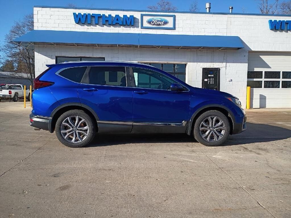 Used 2020 Honda CR-V Touring with VIN 7FARW2H95LE000865 for sale in Cedar Falls, IA