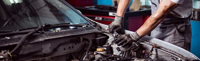 Fixing_Car_Engine.jpg