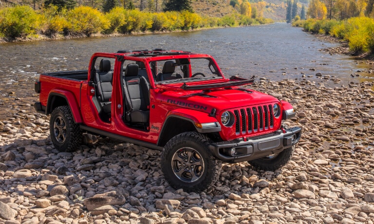 2023 Jeep Gladiator exterior offroad in stream
