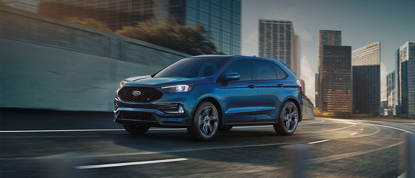 2021 Ford Edge exterior driving on city highway