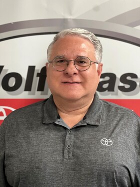 Staff member John Comella from ID_8949441b4d21