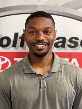 Staff member Latrell Mitchell from ID_8949441b4d21