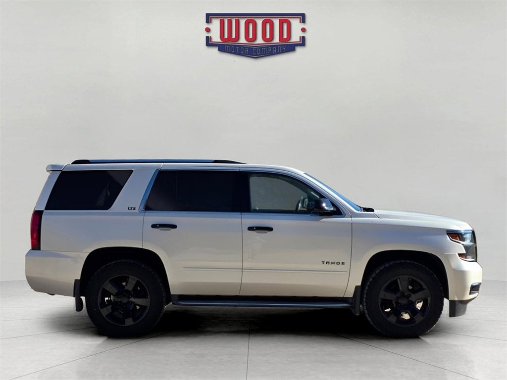 Used 2015 Chevrolet Tahoe LTZ with VIN 1GNSKCKC2FR103072 for sale in Harrison, AR