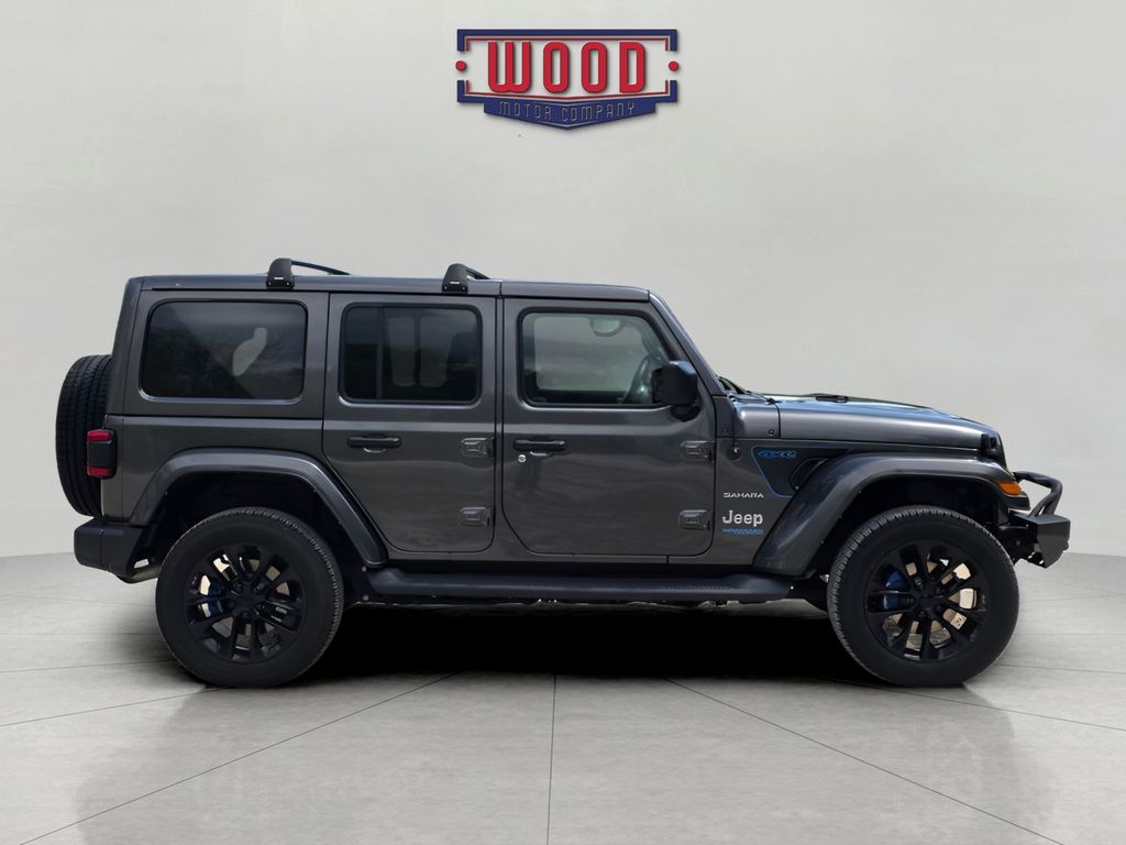 Used 2021 Jeep Wrangler Unlimited Sahara 4XE with VIN 1C4JJXP65MW775871 for sale in Harrison, AR