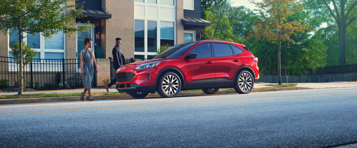 Ford Explorer 2021 Ford Escape parked in front of a building