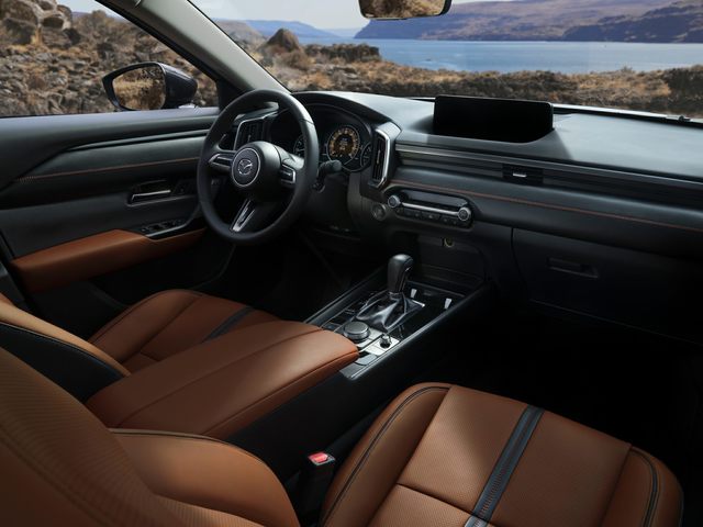 Interior, front seat with instrument view of the Mazda CX-50, available in Omaha