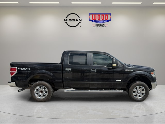 Used 2014 Ford F-150 XLT with VIN 1FTFW1ET9EKD05669 for sale in Kansas City