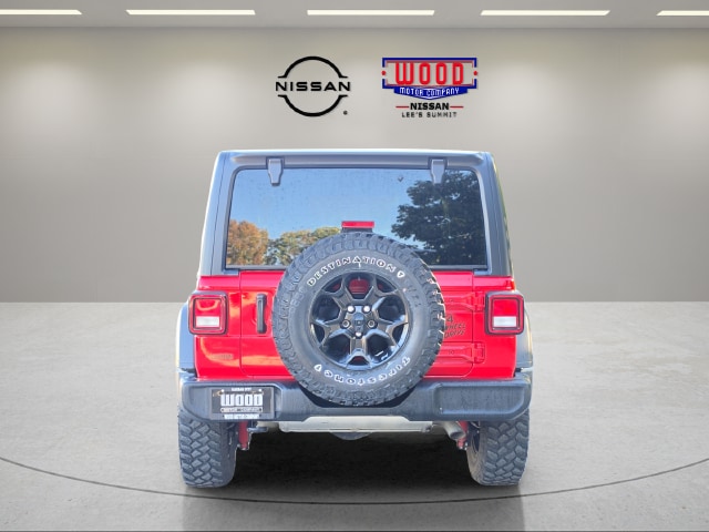 Used 2023 Jeep Wrangler 4-Door Willys with VIN 1C4HJXDG9PW656348 for sale in Kansas City