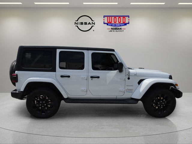Used 2022 Jeep Wrangler Unlimited Sahara 4XE with VIN 1C4JJXP69NW123188 for sale in Kansas City