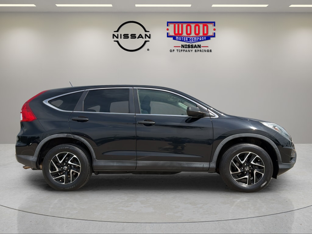 Used 2016 Honda CR-V SE with VIN 5J6RM4H49GL016713 for sale in Kansas City