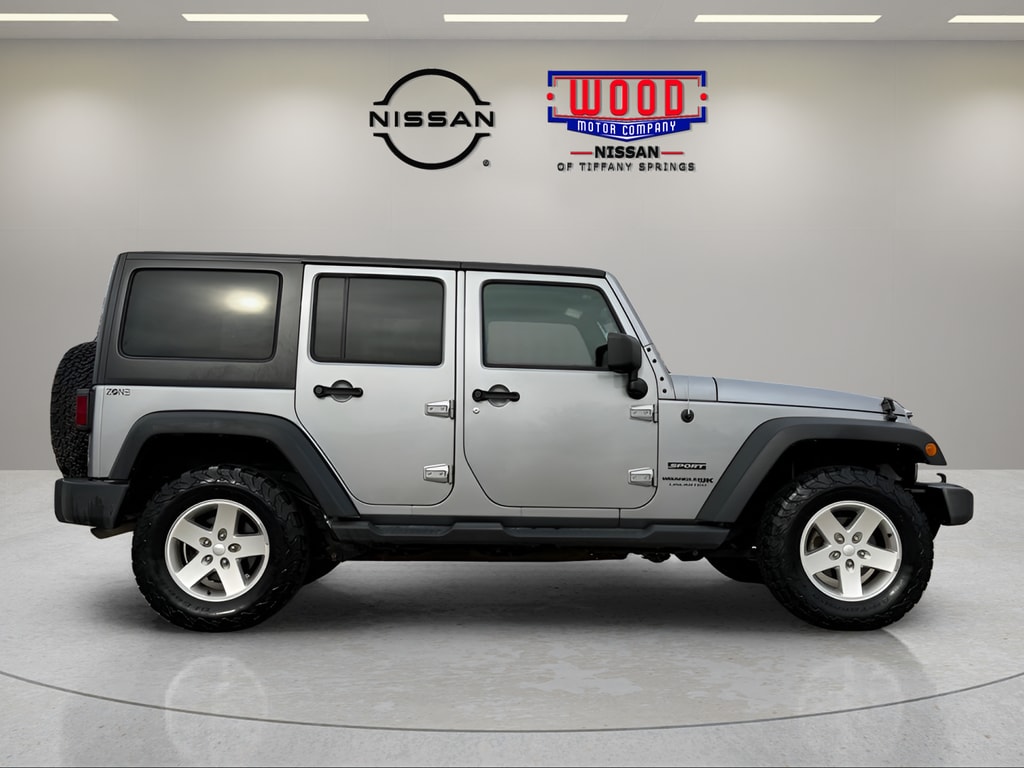 Used 2018 Jeep Wrangler JK Unlimited Sport S with VIN 1C4BJWDG7JL850112 for sale in Kansas City