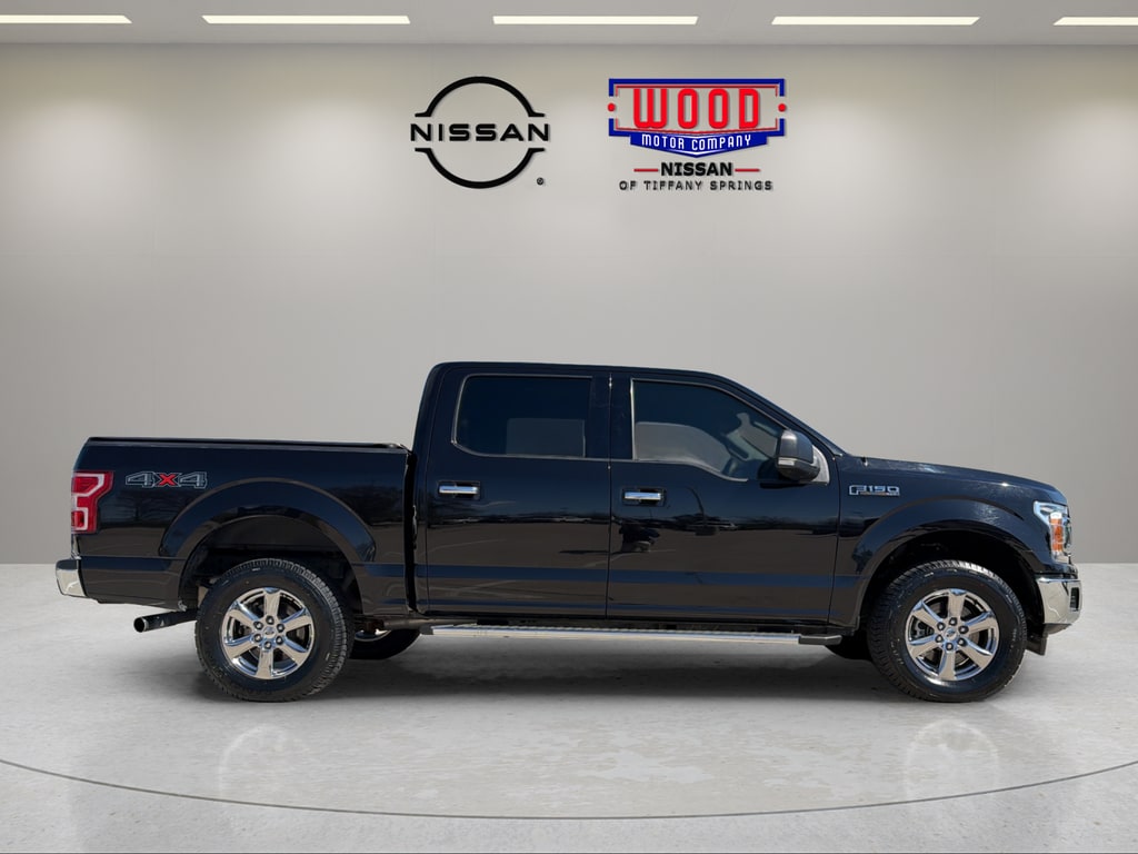 Used 2019 Ford F-150 XLT with VIN 1FTEW1E46KKE36011 for sale in Kansas City