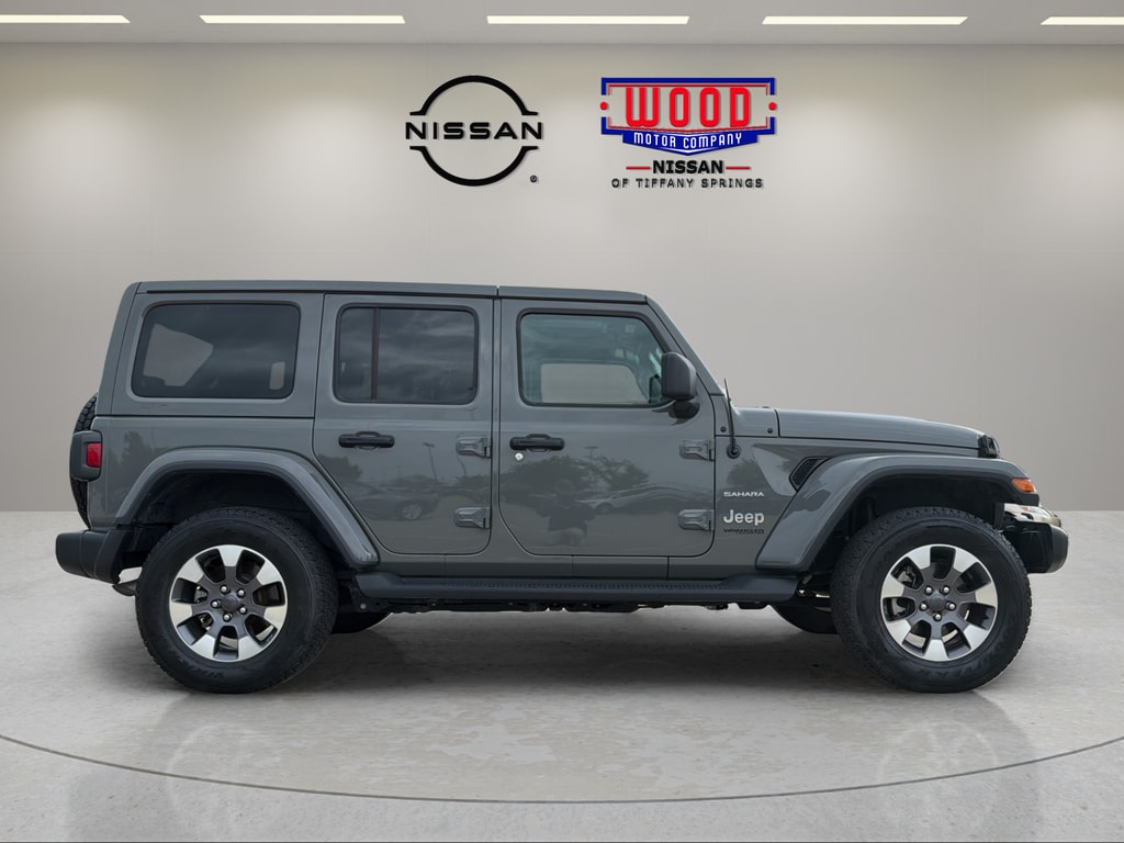 Used 2021 Jeep Wrangler Unlimited Sahara with VIN 1C4HJXENXMW586464 for sale in Kansas City