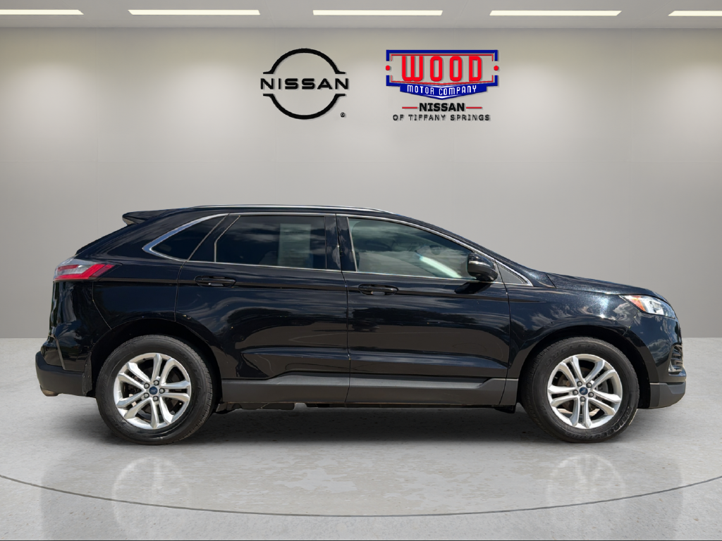 Used 2020 Ford Edge SEL with VIN 2FMPK3J91LBA74016 for sale in Kansas City