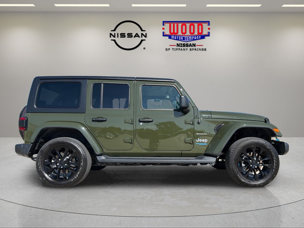 Used 2022 Jeep Wrangler Unlimited Sahara 4XE with VIN 1C4JJXP62NW199108 for sale in Kansas City