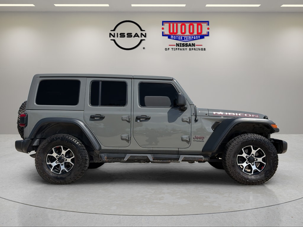 Used 2021 Jeep Wrangler Unlimited Rubicon with VIN 1C4HJXFG4MW604103 for sale in Kansas City