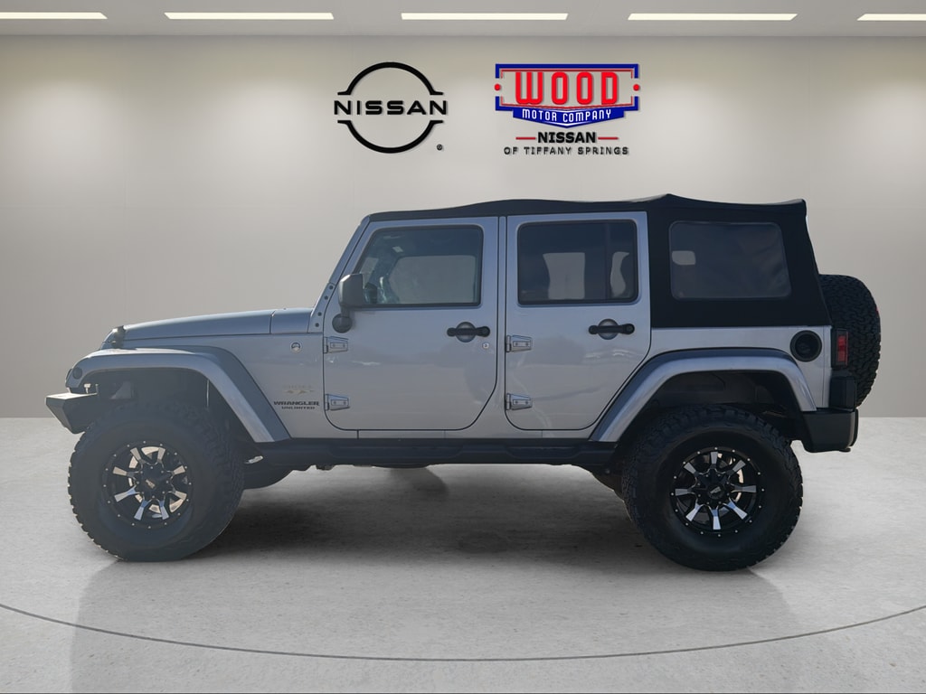 Used 2015 Jeep Wrangler Unlimited Sahara with VIN 1C4BJWEG9FL729748 for sale in Kansas City