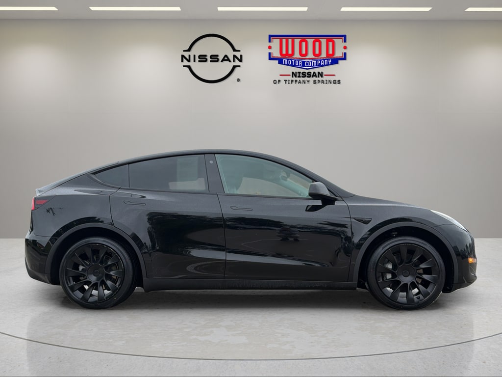 Used 2023 Tesla Model Y Long Range with VIN 7SAYGAEE2PF690163 for sale in Kansas City
