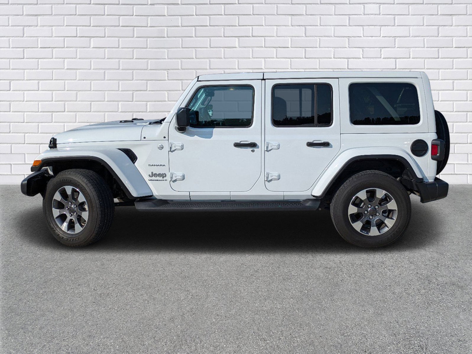 Used 2023 Jeep Wrangler 4-Door Sahara with VIN 1C4HJXEGXPW631585 for sale in Seminary, MS