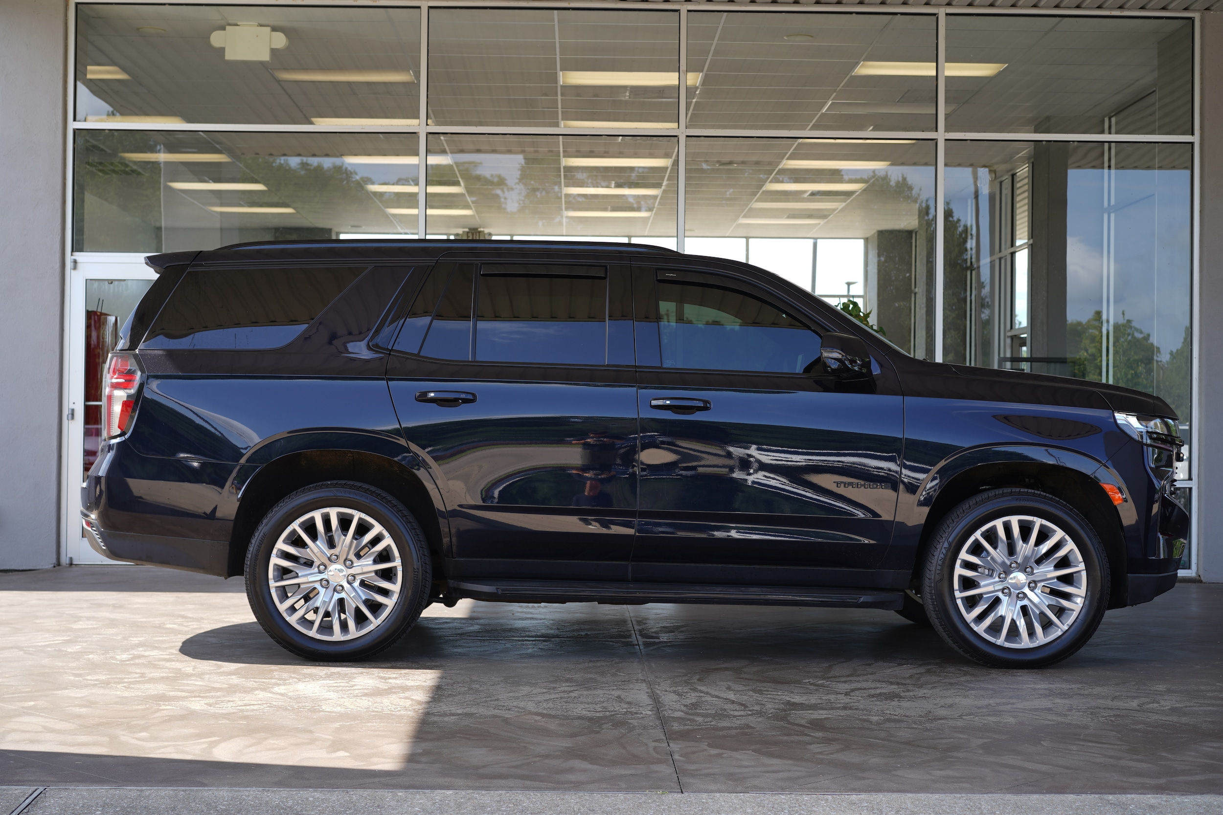 Used 2023 Chevrolet Tahoe RST with VIN 1GNSKRKT9PR554066 for sale in Center, TX