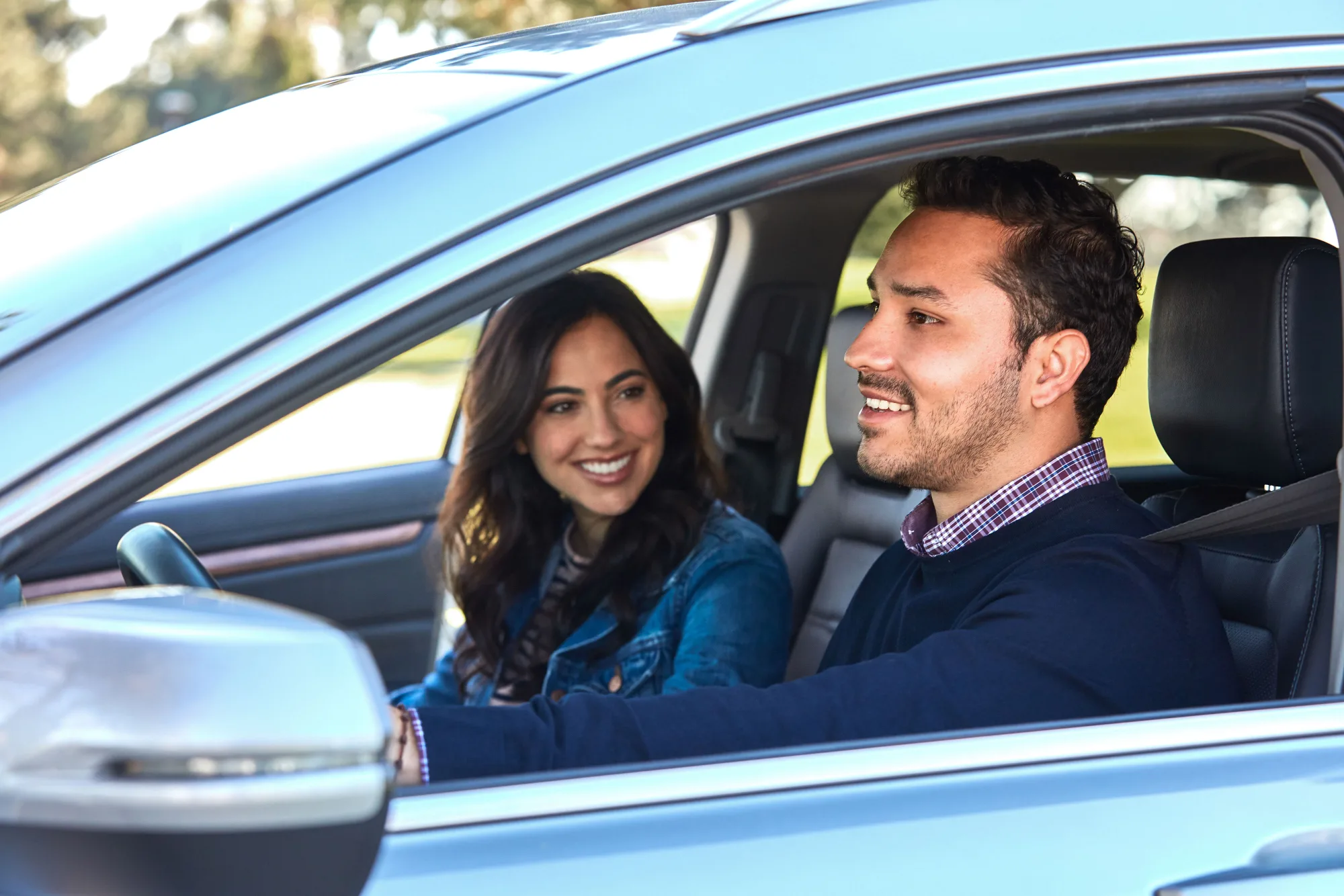 couple riding in vehicle