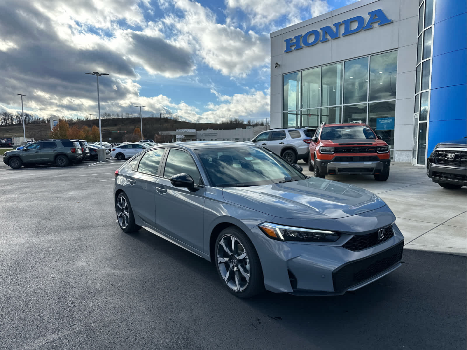 2026 Honda Civic Hybrid Sport Touring Hatchback photo 2