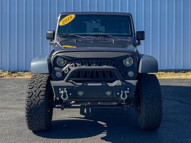 Used 2018 Jeep Wrangler JK Unlimited Sport S with VIN 1C4HJWDG1JL859883 for sale in Manistee, MI