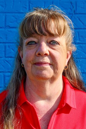 Staff member Lorie Curry from ID_97c456338b77