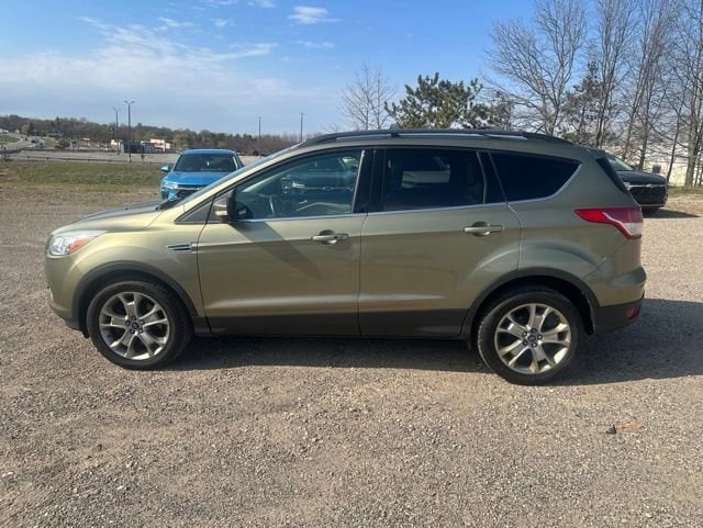 Used 2013 Ford Escape SEL with VIN 1FMCU9H94DUB14263 for sale in Manistee, MI