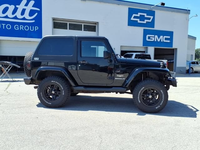 Used 2011 Jeep Wrangler Sahara with VIN 1J4AA5D15BL593125 for sale in Whitehall, MI