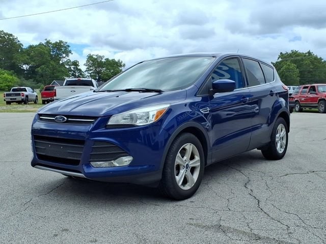 Used 2016 Ford Escape SE with VIN 1FMCU9GX2GUB54331 for sale in Whitehall, MI