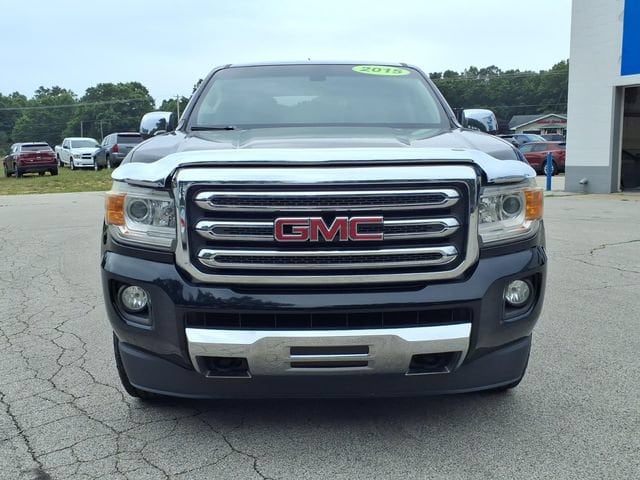 Used 2015 GMC Canyon SLT with VIN 1GTG6CE39F1161130 for sale in Whitehall, MI