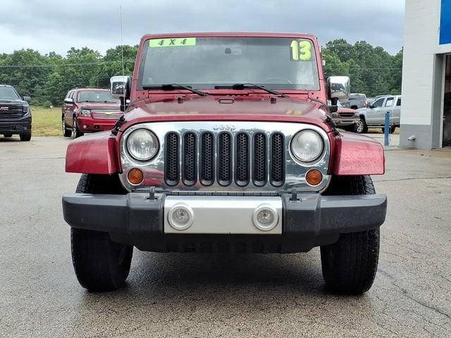 Used 2013 Jeep Wrangler Unlimited Sahara with VIN 1C4HJWEG7DL517650 for sale in Whitehall, MI