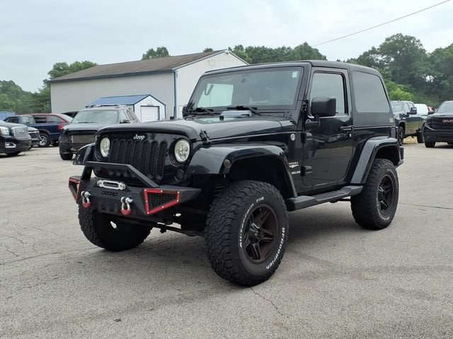 Used 2011 Jeep Wrangler Sahara with VIN 1J4AA5D15BL593125 for sale in Whitehall, MI