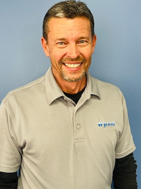 Staff member John Berry from aec62e56fcff