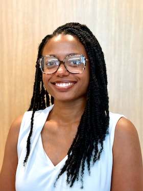 Staff member Malika Musawwir from 010a762373a3