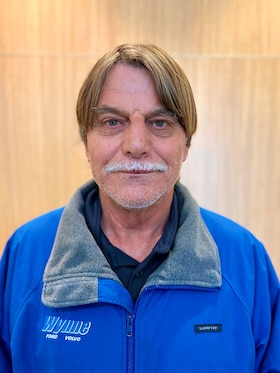 Staff member John Miles from 010a762373a3