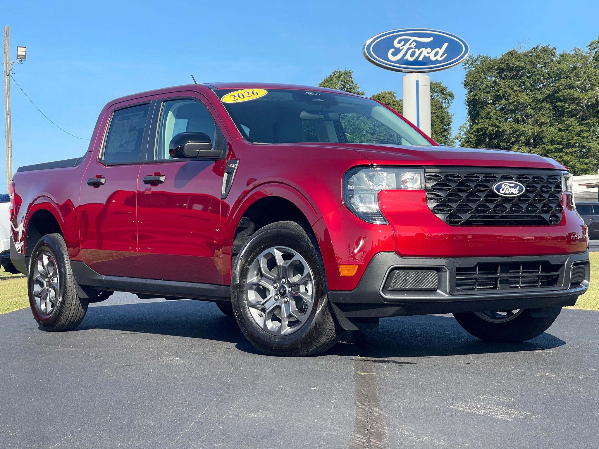 Ruby Red 2026 Ford Maverick Pickup Truck Front-Wheel Drive Continuously Variable Transmission
