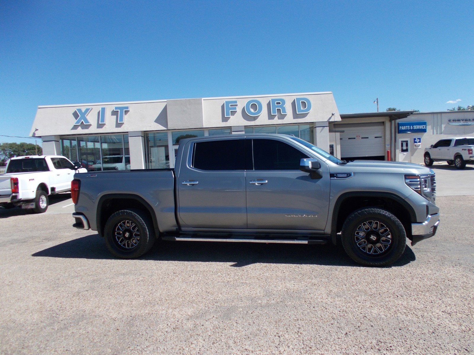 Used 2023 GMC Sierra 1500 SLT with VIN 3GTUUDE87PG167344 for sale in Dalhart, TX