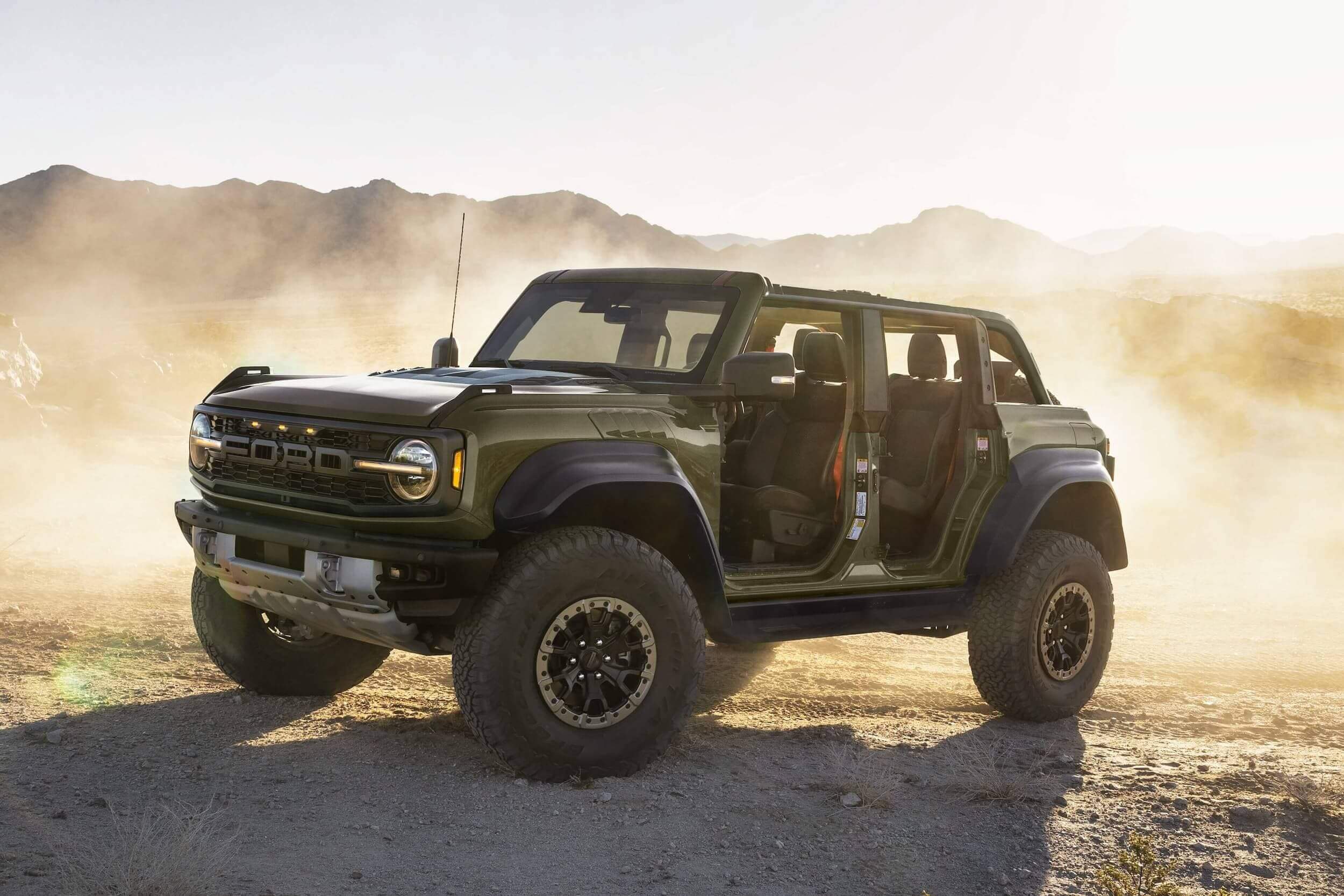Green Ford Bronco in the mountains