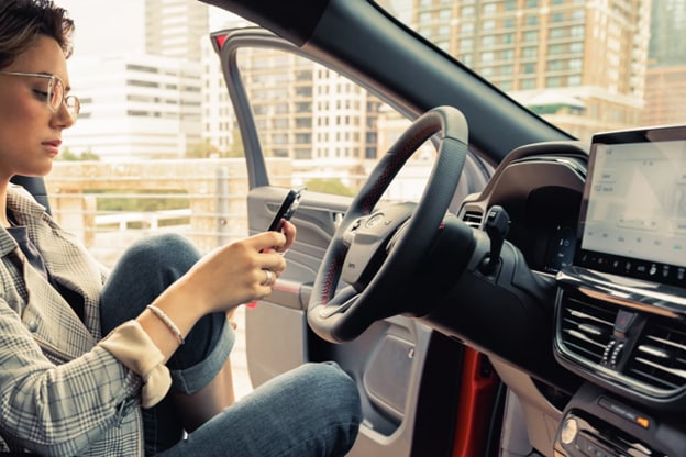 Person%20in%20a%20parked%202024%20Ford%20Escape.png