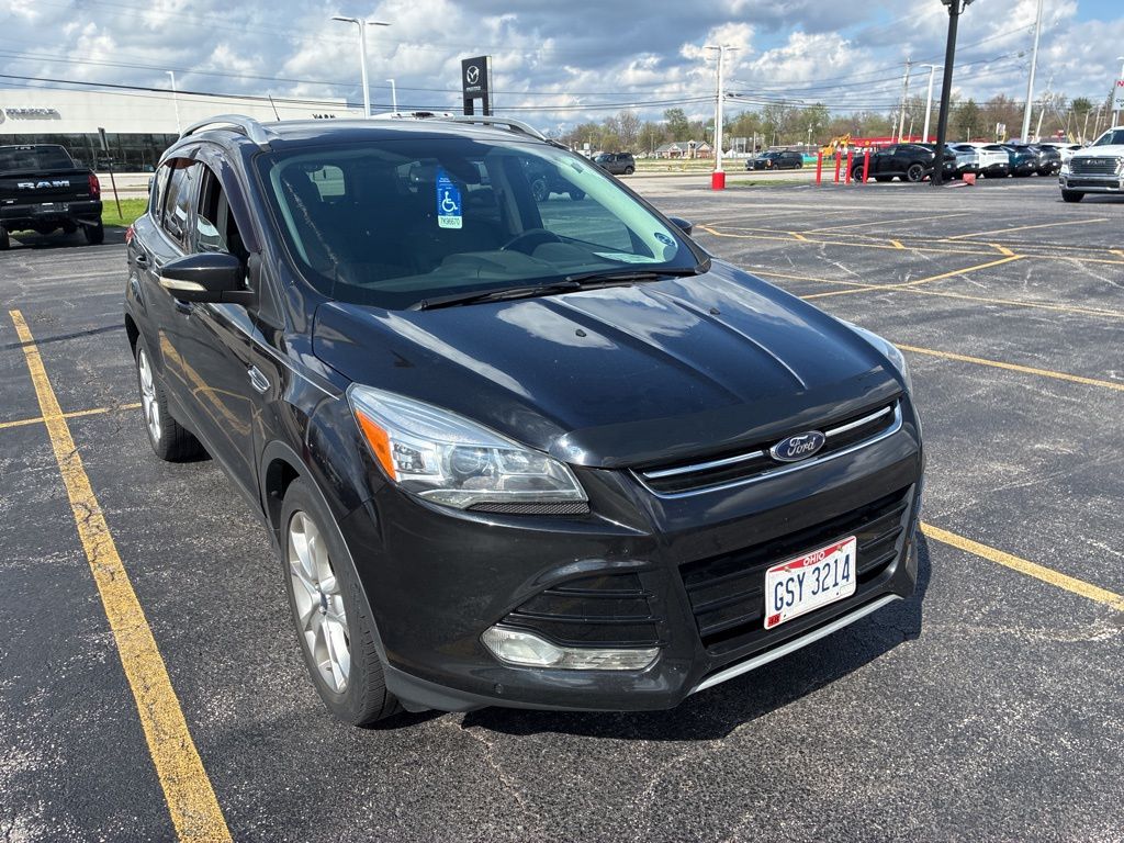 Used 2014 Ford Escape Titanium with VIN 1FMCU0J97EUC67176 for sale in Toledo, OH