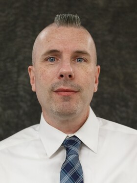 Staff member Chris Newman from a0076723a94c