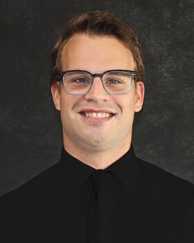 Staff member Nikolas Bishop from ID_54bd67a433cd