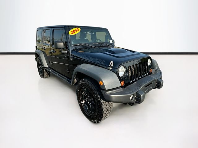 Used 2013 Jeep Wrangler Unlimited Sahara with VIN 1C4BJWEGXDL584295 for sale in Maumee, OH