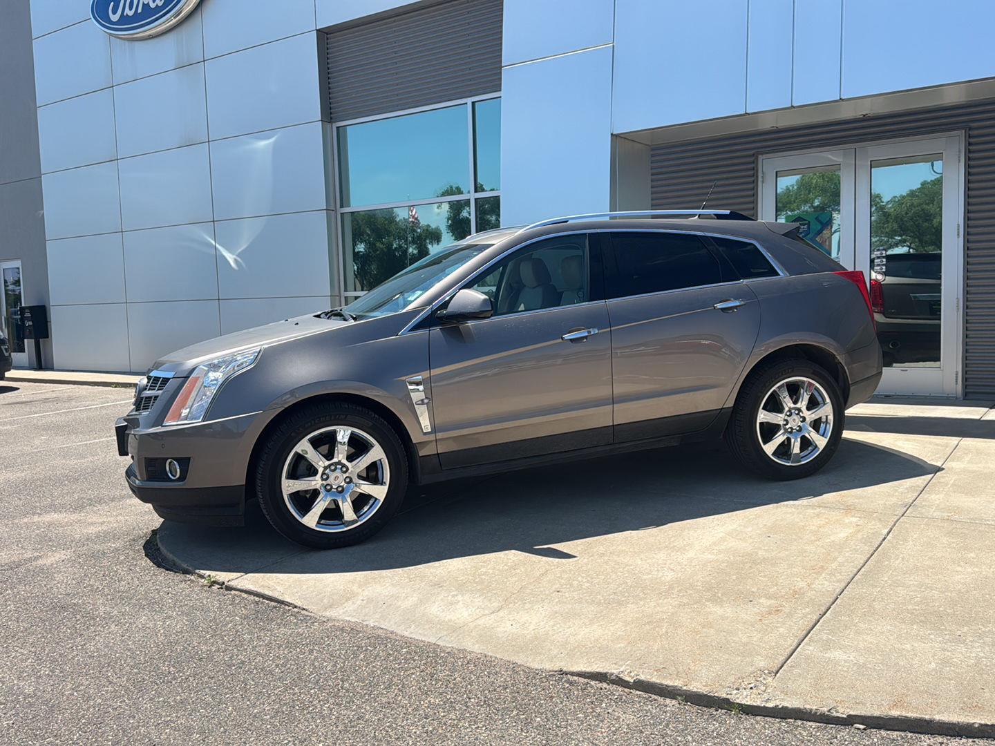 Used 2012 Cadillac SRX Premium Collection with VIN 3GYFNFE30CS527173 for sale in Paynesville, Minnesota