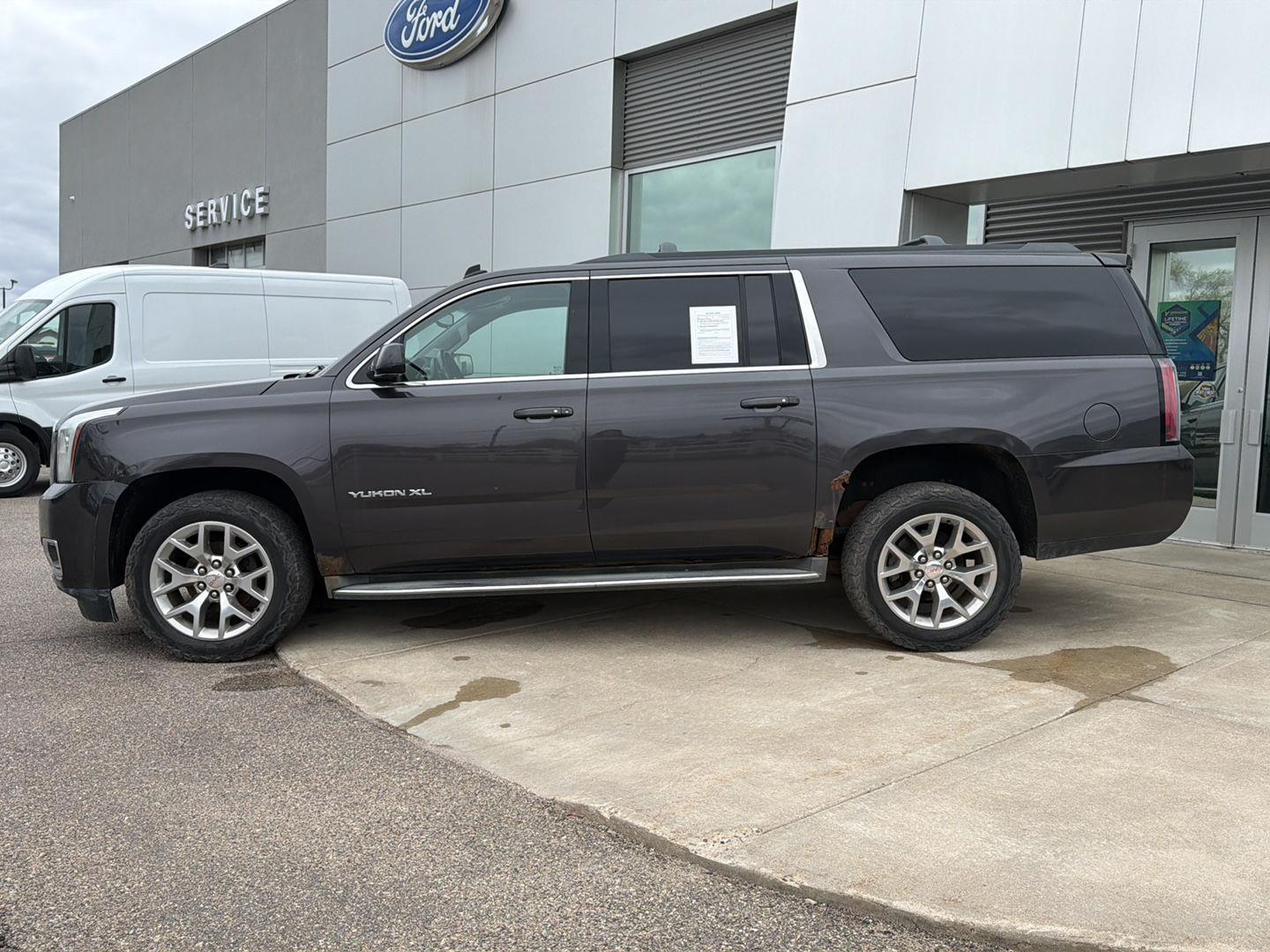 Used 2015 GMC Yukon XL SLT with VIN 1GKS2HKC2FR182270 for sale in Paynesville, Minnesota