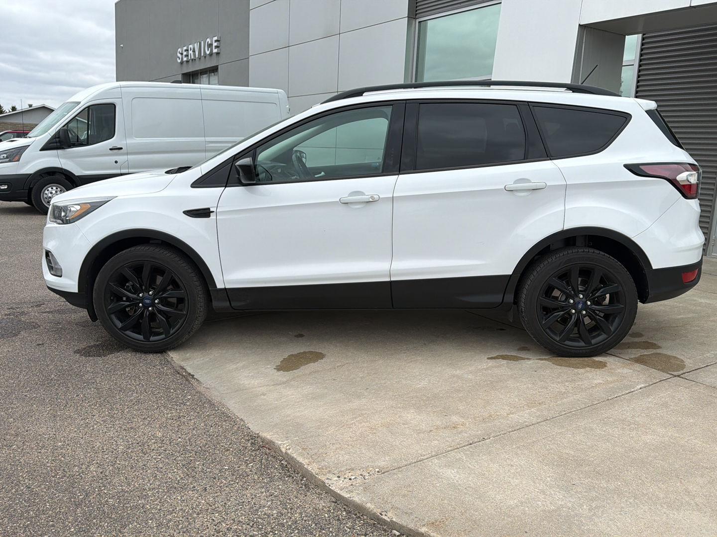 Used 2018 Ford Escape SE with VIN 1FMCU9GD4JUA23799 for sale in Paynesville, Minnesota